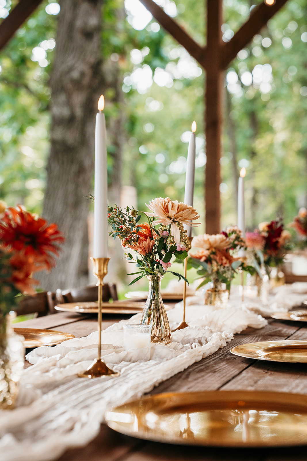 Elegant wedding banquet table with floral centerpieces